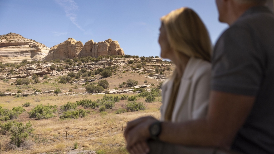Couple looking out from the Canyon Spirit onto Utah
