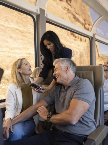 Image of guests laughing and talking with each other
