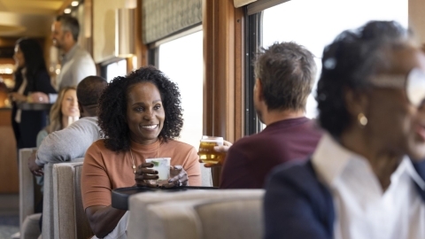 Image of two guests clinking glasses