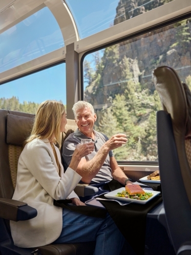 Image of two guests sharing a drink